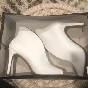 Christian Siriano white heels